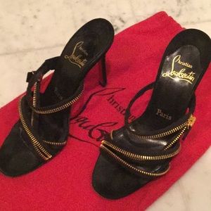 Size 36 black strappy Louboutin’s, gold zip detail